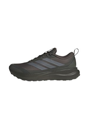 Scarpa sportiva bassa nera con strisce grigie, chiusura con lacci, suola imbottita e linguetta sul tallone, vista laterale.