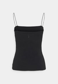 Black tank top with thin straps, made from a smooth material. Features a subtle logo and a scalloped hemline at the bottom.