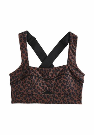 Brown leopard print sports bra with black crossback straps and a smooth texture. Features stitching detail and a cut-out at the front.
