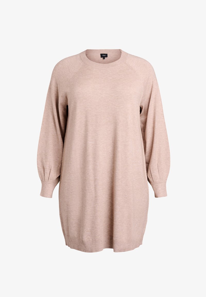 Jasnoprawy, oversize sweter z raglanowymi rękawami, prążkowanymi mankietami i dołem oraz okrągłym dekoltem, wykonany z miękkiego dzianinowego materiału.