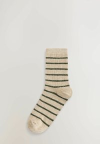Beige sock with horizontal dark green stripes laid flat on a light background.