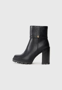 Enkellaarsjes met hoge hak - black