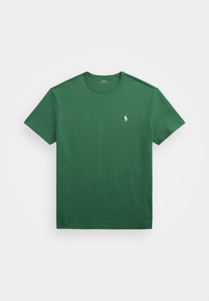 T-shirt de algodão verde com gola redonda, mangas curtas e um pequeno logótipo branco no lado esquerdo do peito. Textura suave, corte clássico.