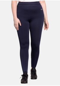 Navy leggings made of stretch fabric, featuring a high waistband and a small brand logo on the left hip. Smooth texture and form-fitting design.