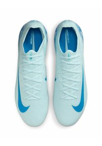 Light blue soccer cleats with a textured upper, featuring a dark blue swoosh and intricate patterns, round toe, and standard lacing closure.