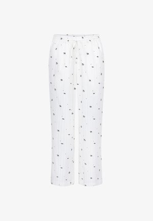 Lichte, witte pyjamabroeken met een elastische tailleband en trekkoord, voorzien van een verspreid bloemenpatroon in zwart en rood.