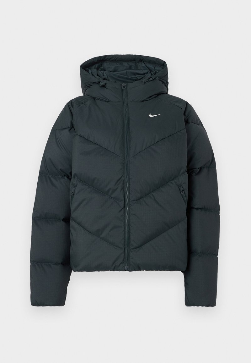 Dark green puffer jacket with a hood, featuring a zip closure, chevron stitching, and a small white logo on the left chest.