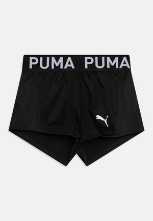 Bermudas deportivas negras hechas de un tejido transpirable. Tienen una cinturilla negra ancha con "PUMA" en blanco y un logo blanco en la pierna.