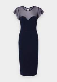 Marineblå bodycon-kjole med et gennemsigtigt meshoverlay og flæseærmer. Har en sweetheart-udskæring og en nøglehulslukning bagpå.