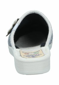 Gray fabric slip-on shoe with white sole, featuring a curved back and soft interior lining. Includes a decorative accent near the heel.