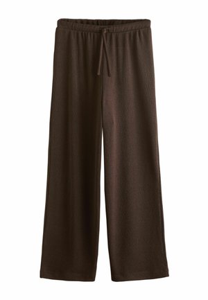 Tummanruskeat väljälahkeiset housut, joissa on joustava vyötärönauha ja edessä kiristysnauha, valmistettu pehmeästä teksturoidusta kankaasta.