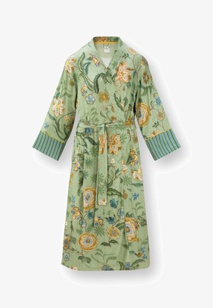 Groene bloemenpatroon corduroy kimono-jas met gestreepte manchetten en bijpassende stoffen riem die om de taille is gestrikt.