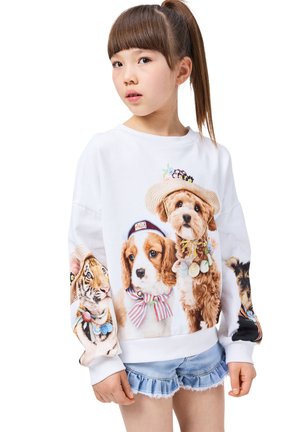 Felpa bianca con stampati design giocosi di quattro cani e una tigre. Collo a girocollo rigato, maniche lunghe e texture di tessuto morbido.