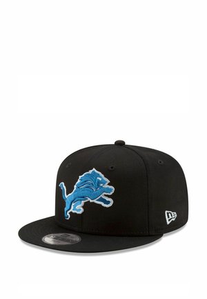 Black baseball cap with a structured design, featuring a blue embroidered lion logo and white accents on the front and side.