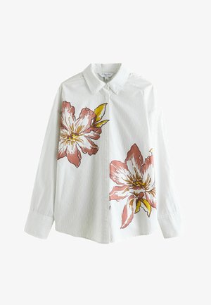 Valkoinen napitettava paita, jossa ohuet pystysuorat raidat ja suuret pinkit ja keltaiset kukkakuviot edessä ja hihoissa.