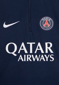 Navy blue athletic jersey with white Nike logo, large "QATAR AIRWAYS" text, and circular Paris Saint-Germain emblem featuring red and blue details.