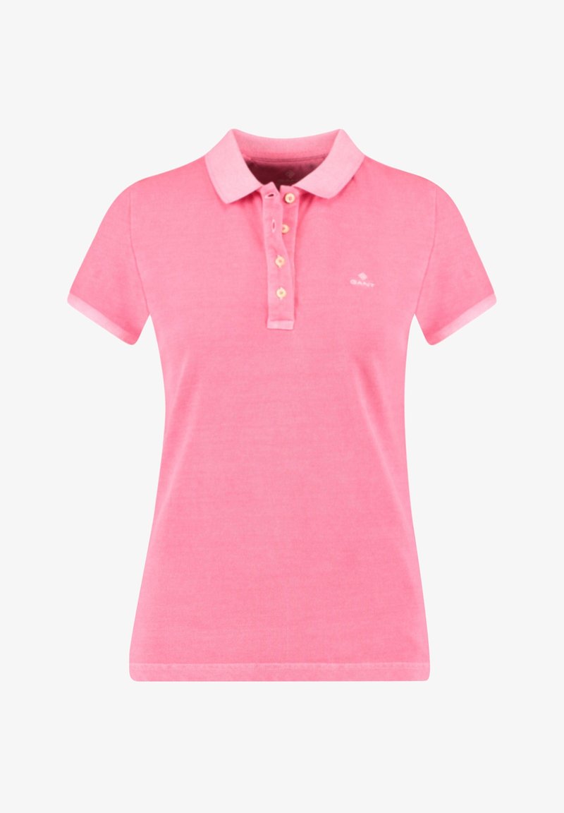 Rosa polo skjorta med korta ärmar, knappad krage, fin textur och logotyp på bröstet. Har kontrasterande manschetter.