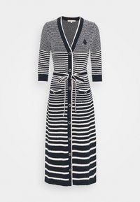 Vestito cardigan a righe navy e bianche in maglia con cintura, chiusura con bottoni frontale, maniche a tre quarti e due tasche frontali.