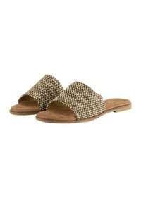 Sandali open-toe con tomaia intrecciata beige e nera, suola piatta beige e texture liscia. Presentano cinturini larghi e un design minimalista.