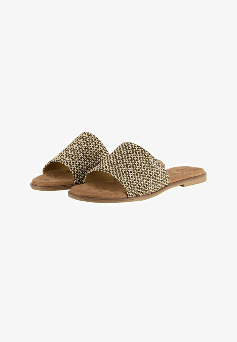Open-toe sandals with woven beige and black upper, flat tan sole, and smooth texture. Features wide straps and minimalistic design.