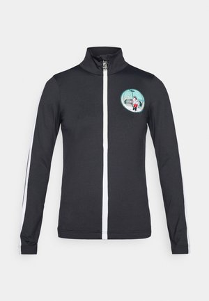 Zwarte sportjack met witte zijstrepen, hoge kraag en een cirkelvormig geborduurd ontwerp met een figuur in een rood-wit outfit.