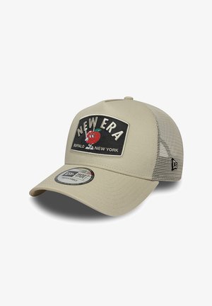 Beige mesh-back cap with curved brim, featuring a "New Era" patch with a cartoon apple and "Buffalo New York" text. Adjustable strap style.