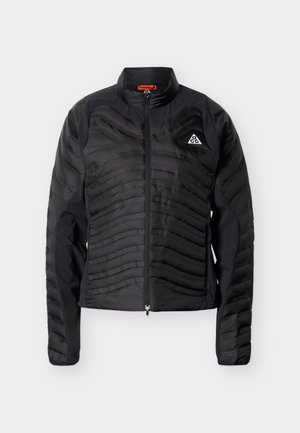 Black insulated jacket with a zip front, featuring textured horizontal stripes, a stand collar, and an accent logo on the chest.