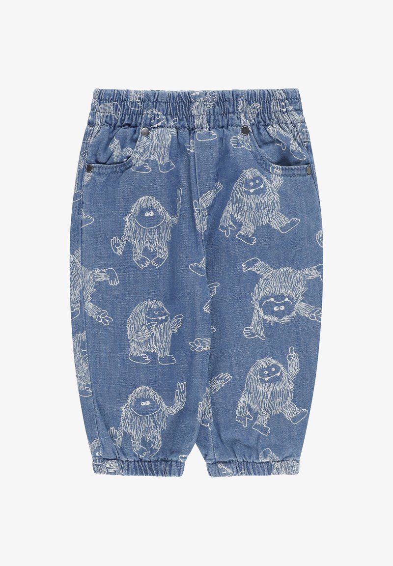 Pantaloni shorts in denim blu con vita elastica, caratterizzati da disegni bianchi di creature pelose in stile cartoon in varie pose, e due tasche laterali.