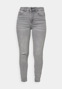 Vaqueros skinny de tiro alto gris con ligero desgaste en la rodilla, diseño tradicional de cinco bolsillos y una textura de denim suave.