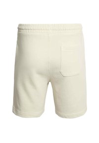 Pantaloncini casual color crema con fascia elastica in vita e una tasca applicata posteriore singola, mostrati da dietro.