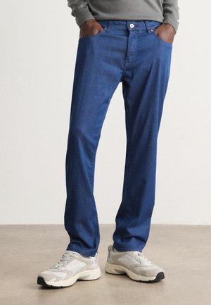 DELAWARE - Jeans slim fit - light pastel blue