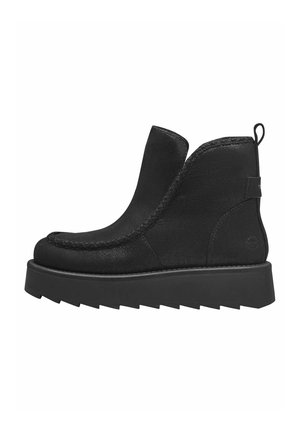 Bottines noires en tissu texturé, avec une semelle plateforme robuste, des coutures le long des bords et une languette à l'arrière.