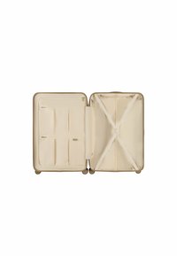 Harde-koffer in beige, met een interieur dat organisatorische vakken, ritscompartimenten en kruisbanden voor het beveiligen van de inhoud bevat.