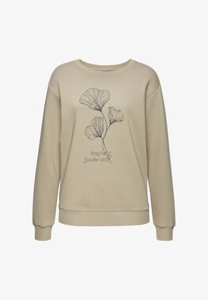 Beżowa bluza z długimi rękawami, kwiatowy rysunek liniowy i tekst "Stay wild flower child" z przodu.