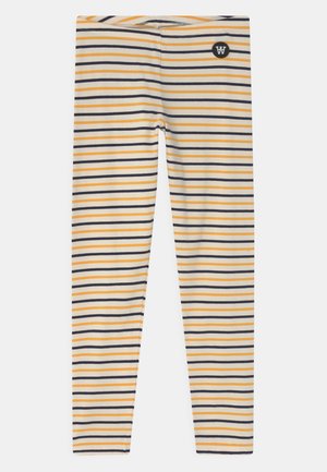 Leggings listrados em amarelo, branco e azul-marinho. Apresentam um design ajustado com um cós elástico e um pequeno emblema na parte superior da perna.