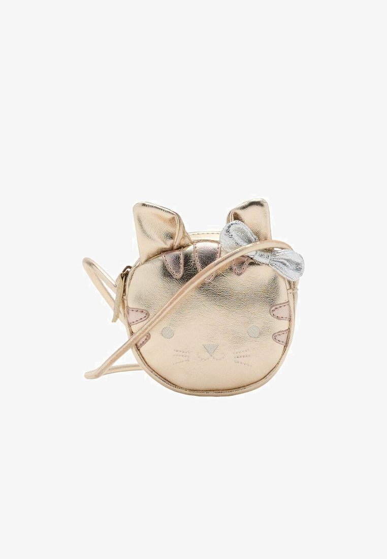 Sac en or métallique en forme de chat avec un accent de nœud argenté, texture douce, forme arrondie et traits du visage brodés dans des couleurs contrastées.