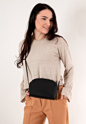 TILDA - Across body bag - schwarz
