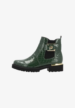 Bottine verte brillante à texture crocodile, panneau latéral élastique noir, détail boucle dorée, et semelle épaisse noire avec accent doré.
