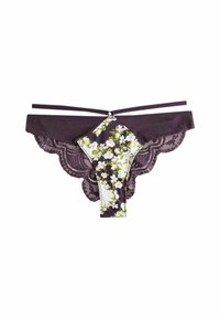 Mežģīņu apakšveļa tumši violetā krāsā ar ziedu audumu priekšā, viļņotām maliņām un plānām siksniņām. Iezīmē ziedu rakstu baltā un zaļā krāsā.
