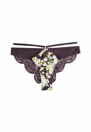 Lingerie en dentelle de couleur violet foncé avec un devant en tissu floral, des bords ondulés et des fines bretelles. Présente un motif floral en blanc et vert.