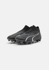 Puma Scarpe da calcio per terreni duri - black