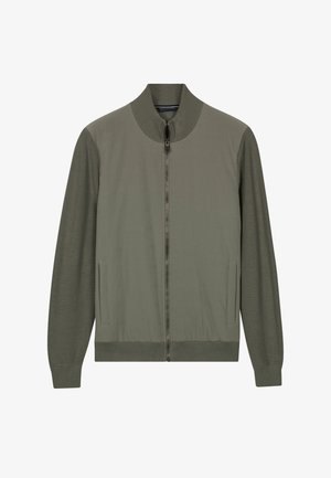 Oliemerkleurig jack met ritssluiting, geribde kraag, manchetten en zoom, voorzien van lange mouwen en twee zakken aan de voorkant.