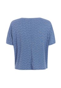 Haut bleu à manches courtes avec un motif en zigzag chevron, vu de dos.