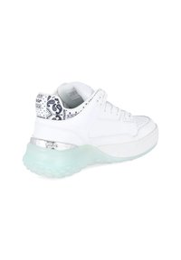 White leather sneaker with a patterned navy blue heel, translucent mint green sole, and metallic silver accents on the side.