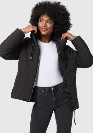 Black puffer jacket with a hood, zip closure, adjustable drawstrings, quilted design, and side pockets, worn over a white shirt and dark jeans.