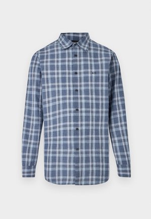 Camisa de cuadros azul y blanca de manga larga, con cuello y pequeño logo bordado de A|X en el pecho.