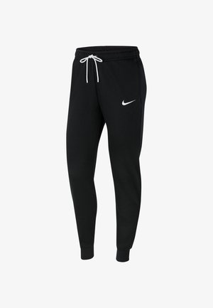 Schwarze Sweatpants aus weichem Material, mit einem elastischen Bund und Kordelzug, schmal zulaufenden Beinen und einem weißen Nike-Logo auf dem linken Oberschenkel.