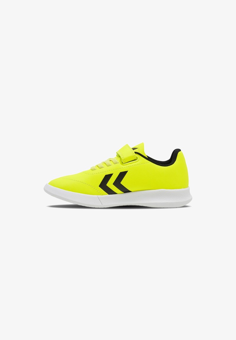 Neon yellow athletic shoes with a textured finish, black accents, and a secure Velcro strap over the laces. White sole with slight curve.