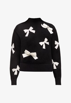 Czarny sweter z dzianiny z białymi aplikacjami w kształcie kokardy, okrągłym dekoltem oraz prążkowanymi mankietami i dołem. Tkanina wydaje się być miękka o teksturowanym wykończeniu.