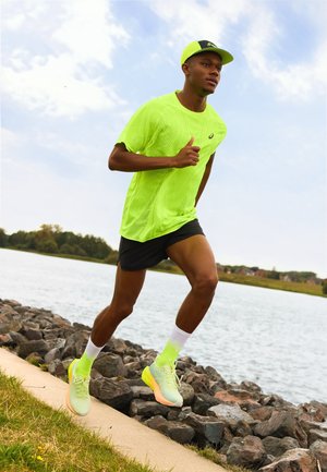 ASICS, METARUN TOP - Camiseta deportiva - safety yellow